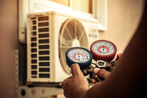 Professional Hvac technician working in Brookline, MA